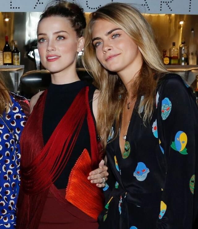 johnny-depp-in-eski-esi-amber-in-unlu-modelle-15034082_3017_m
